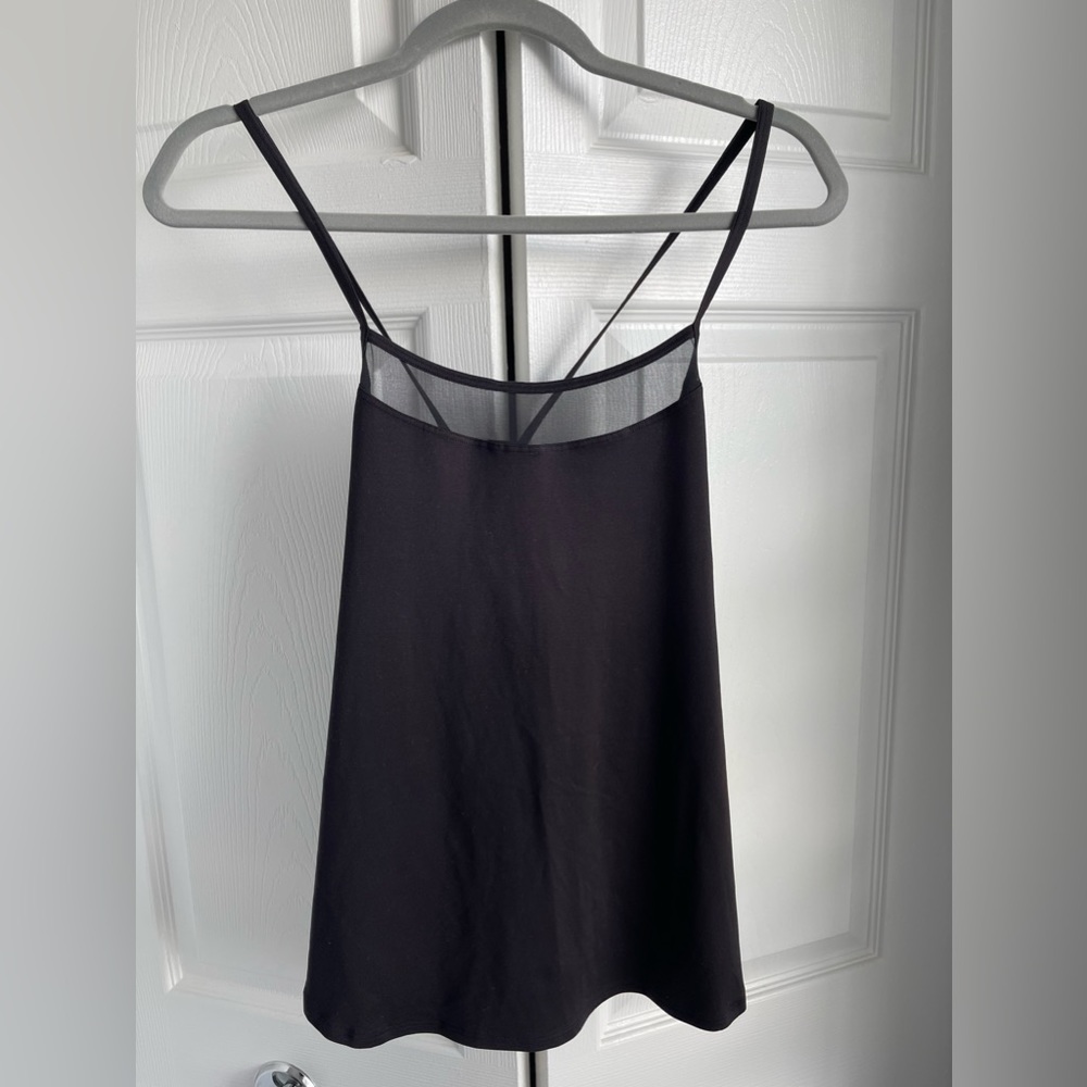 Athleta | black crisscross back straps with round side slits | size: m